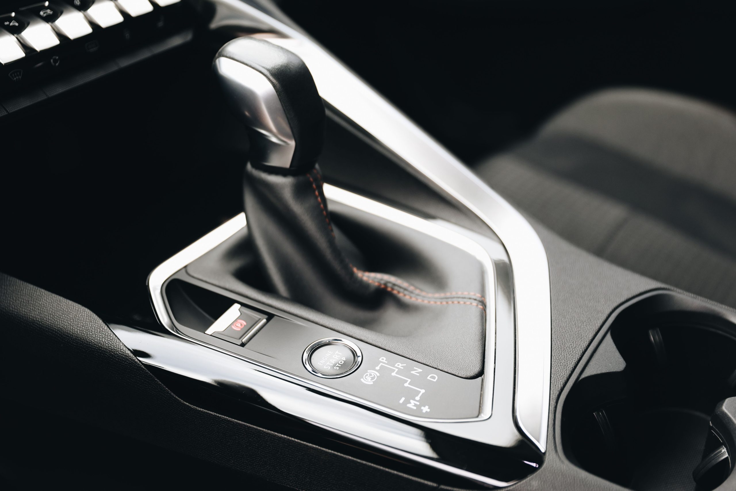 Services Close-up of a modern car gear shift in Sivas, Türkiye, showcasing sleek design.